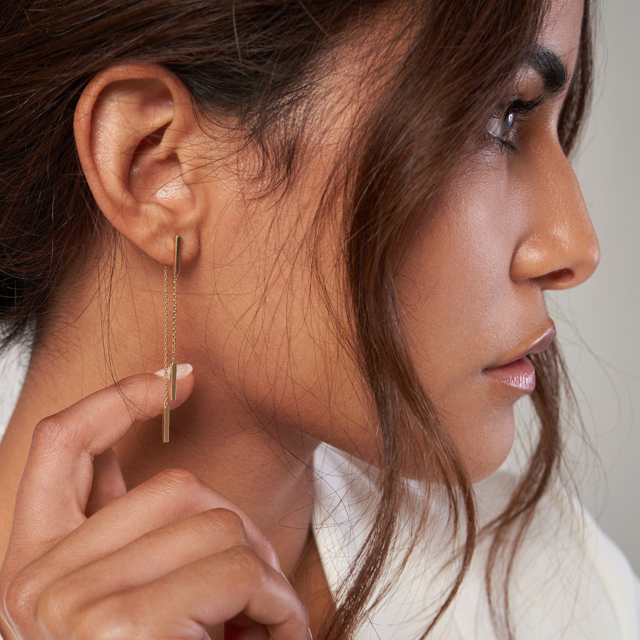 14K gold double staple bar earrings, featuring a minimalist design perfect for everyday wear.