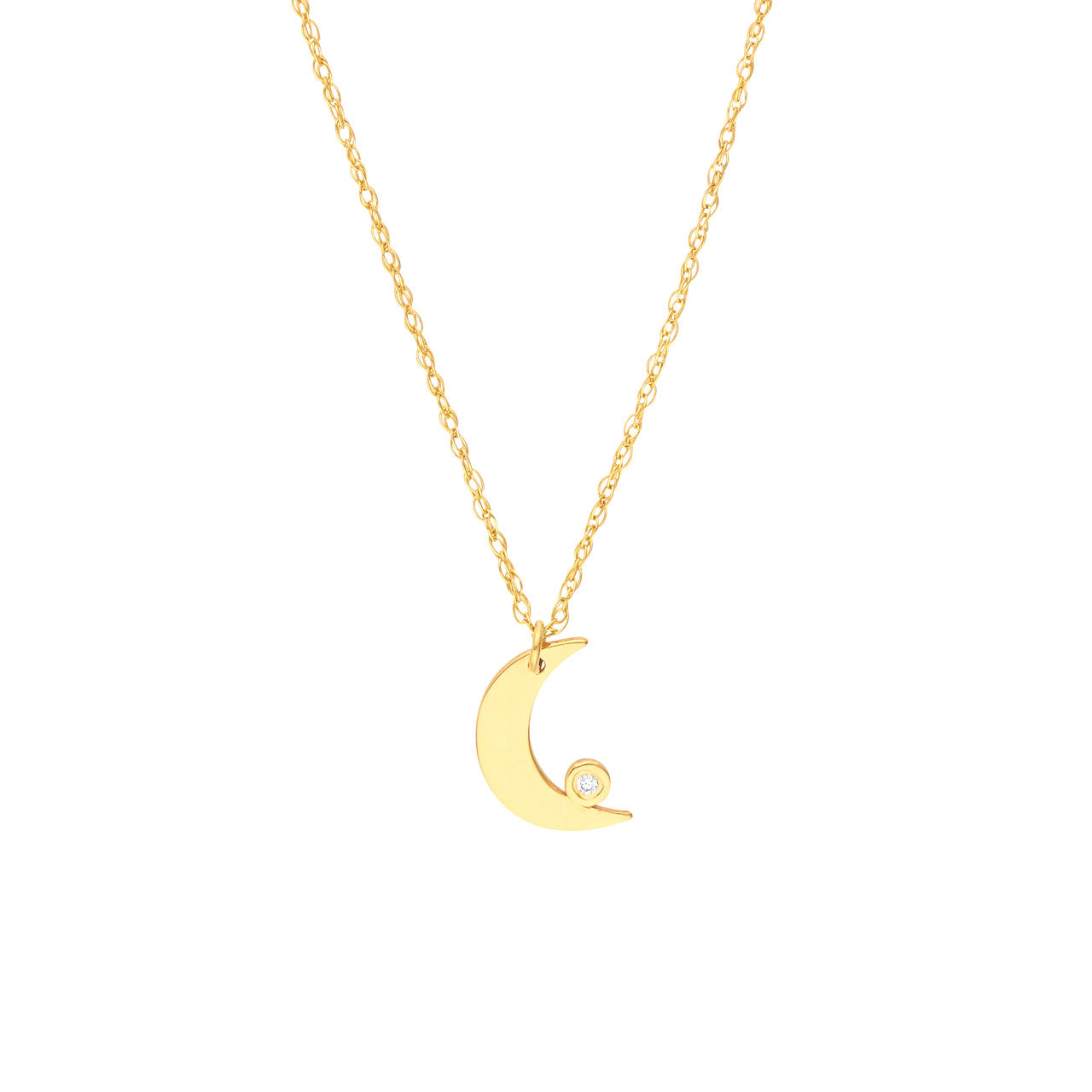 Simple diamond bezel half moon necklace by My Store on a delicate chain against a neutral background.