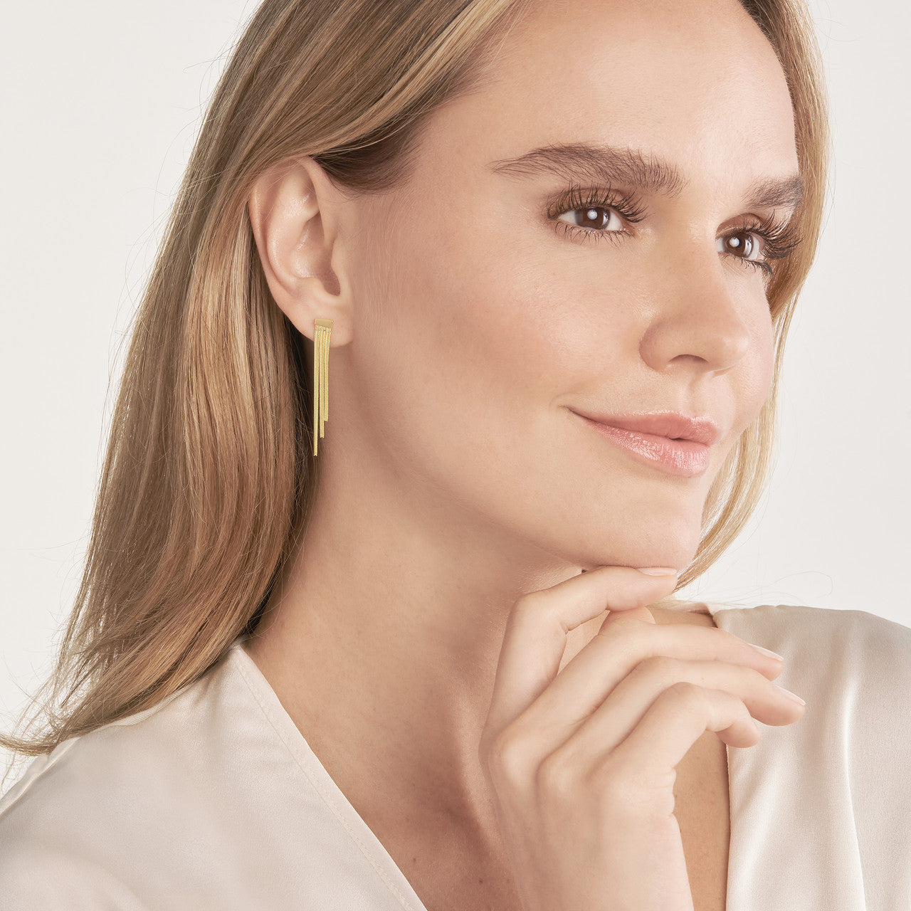 Simple ascending triple snake chain earrings by My Store, featuring a sleek design and elegant curves.