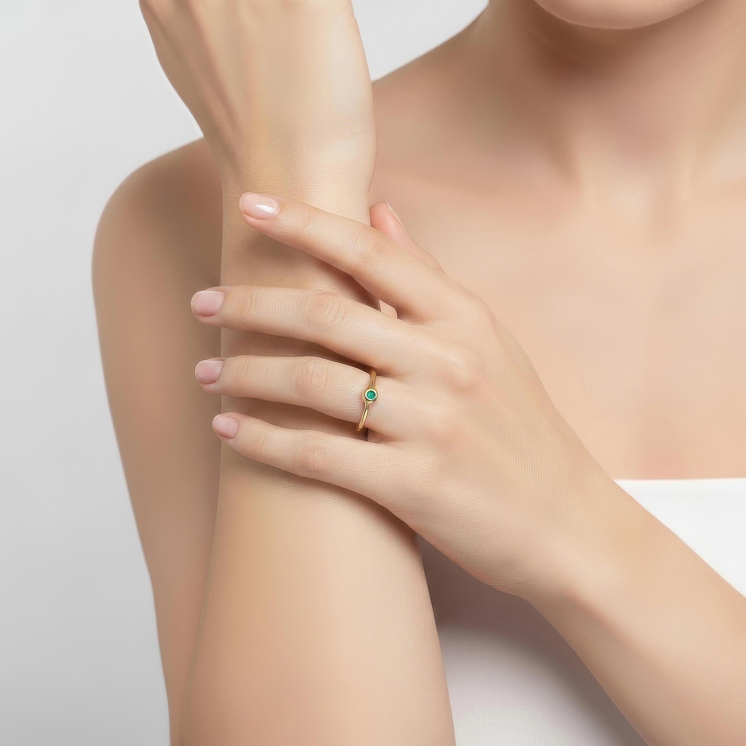 Orbit Emerald Ring