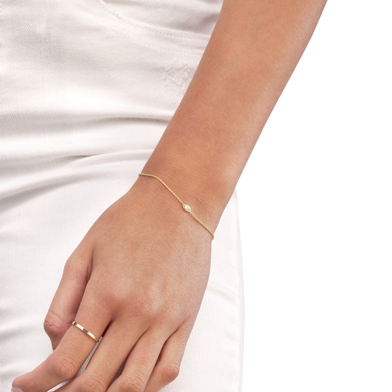 14K gold diamond evil eye bolo bracelet with sparkling diamonds, detail view