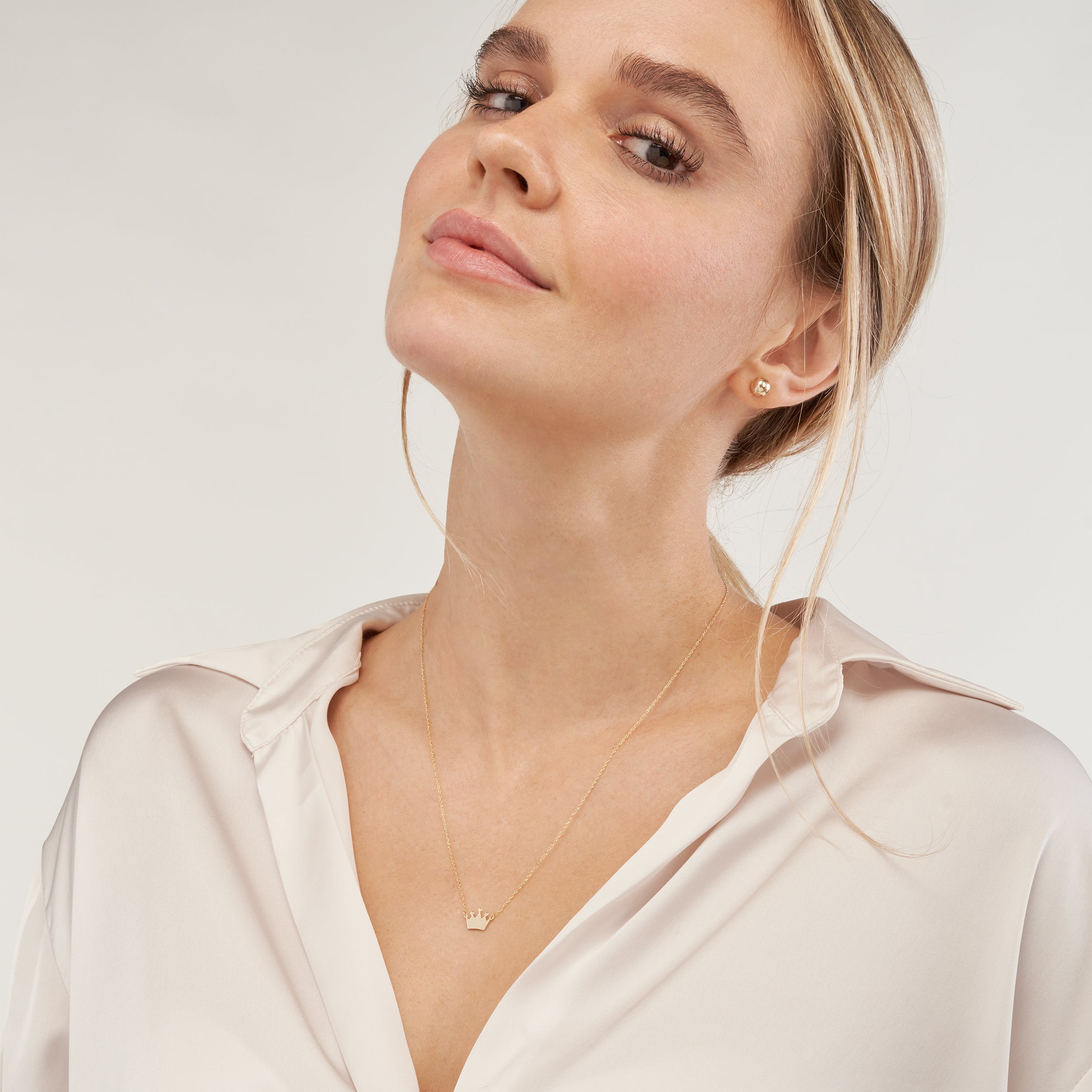 14K gold mini crown pendant necklace, detail view