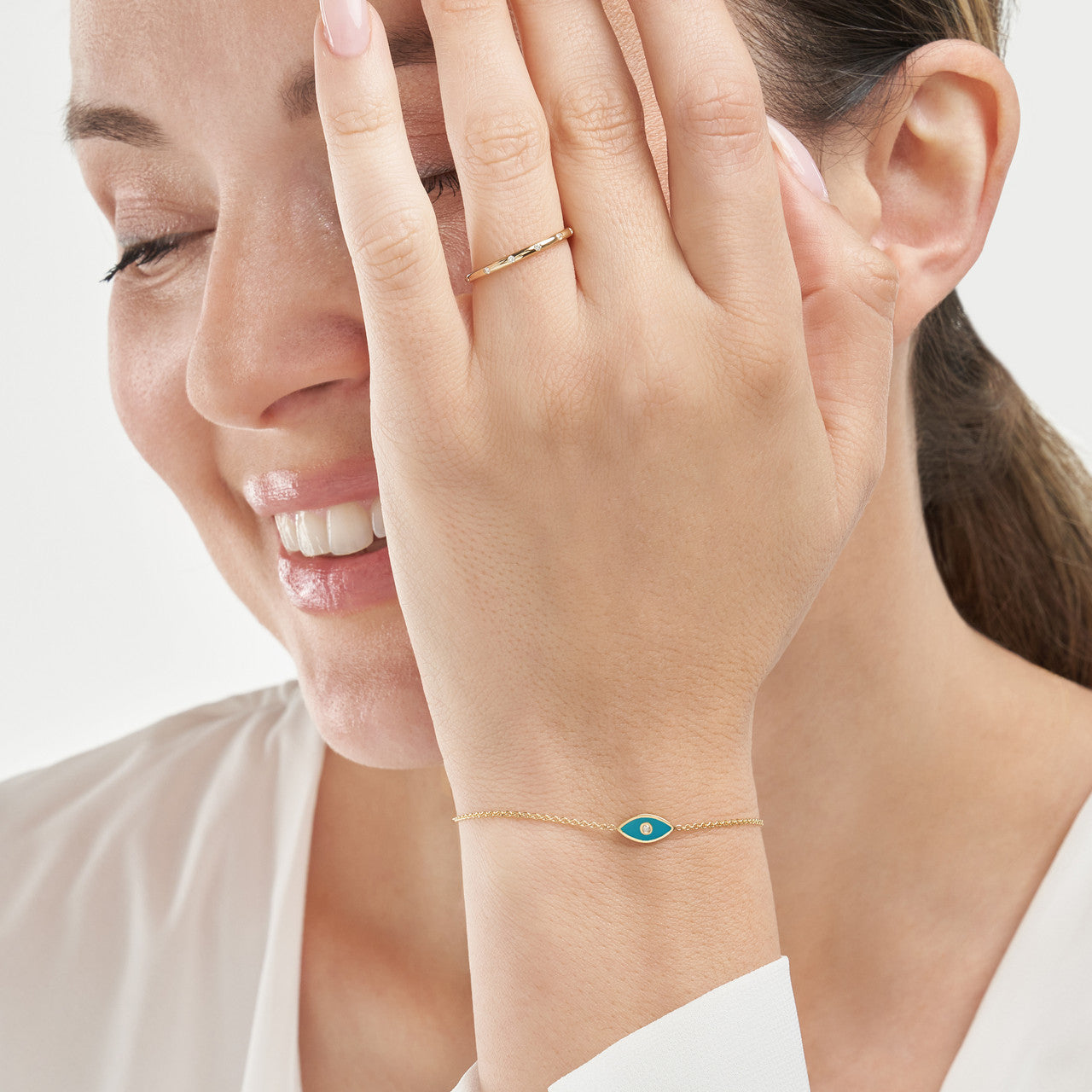 14K gold blue enamel evil eye bolo bracelet, detail view