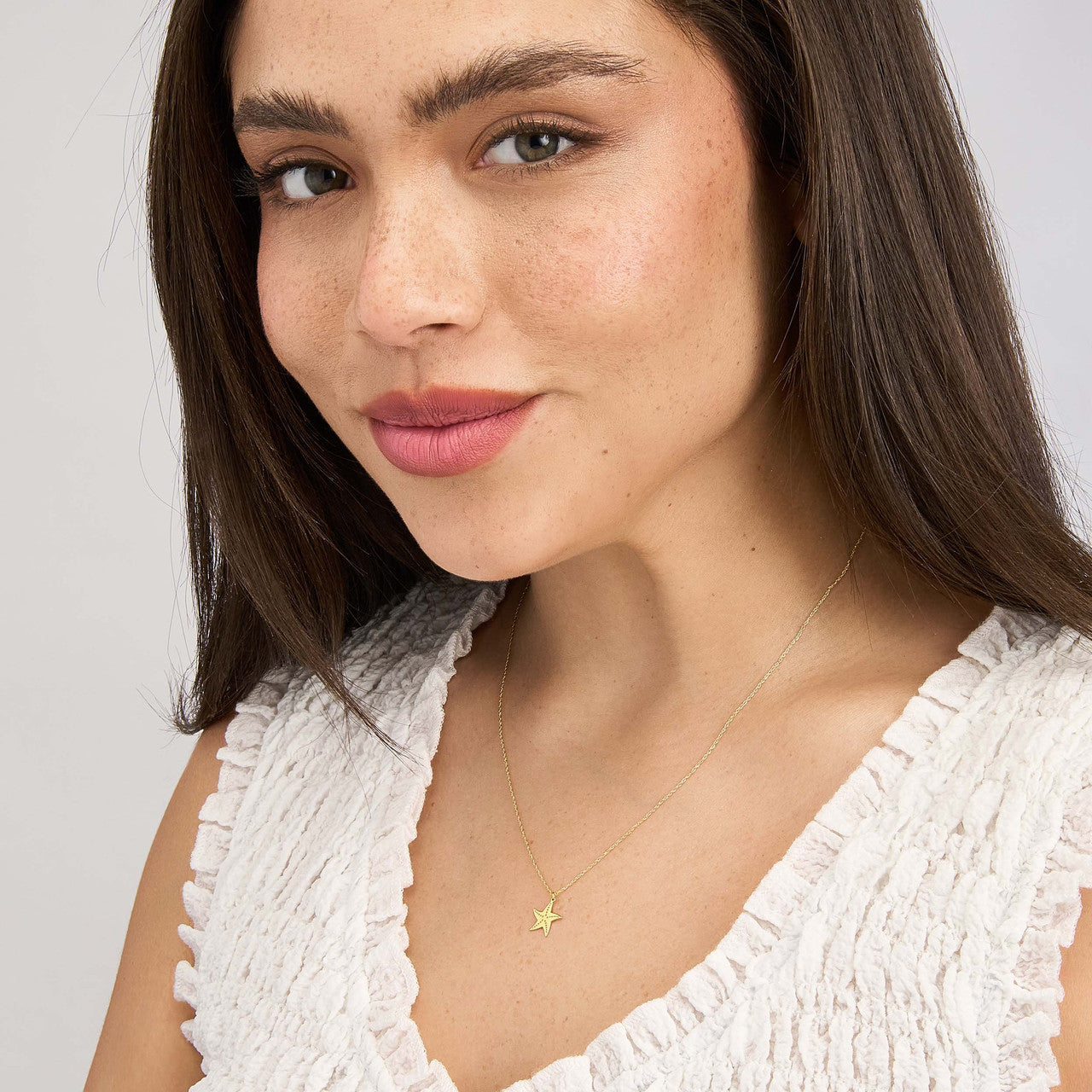 Simple starfish necklace by My Store, featuring a delicate design and a shimmering finish on a slender chain.