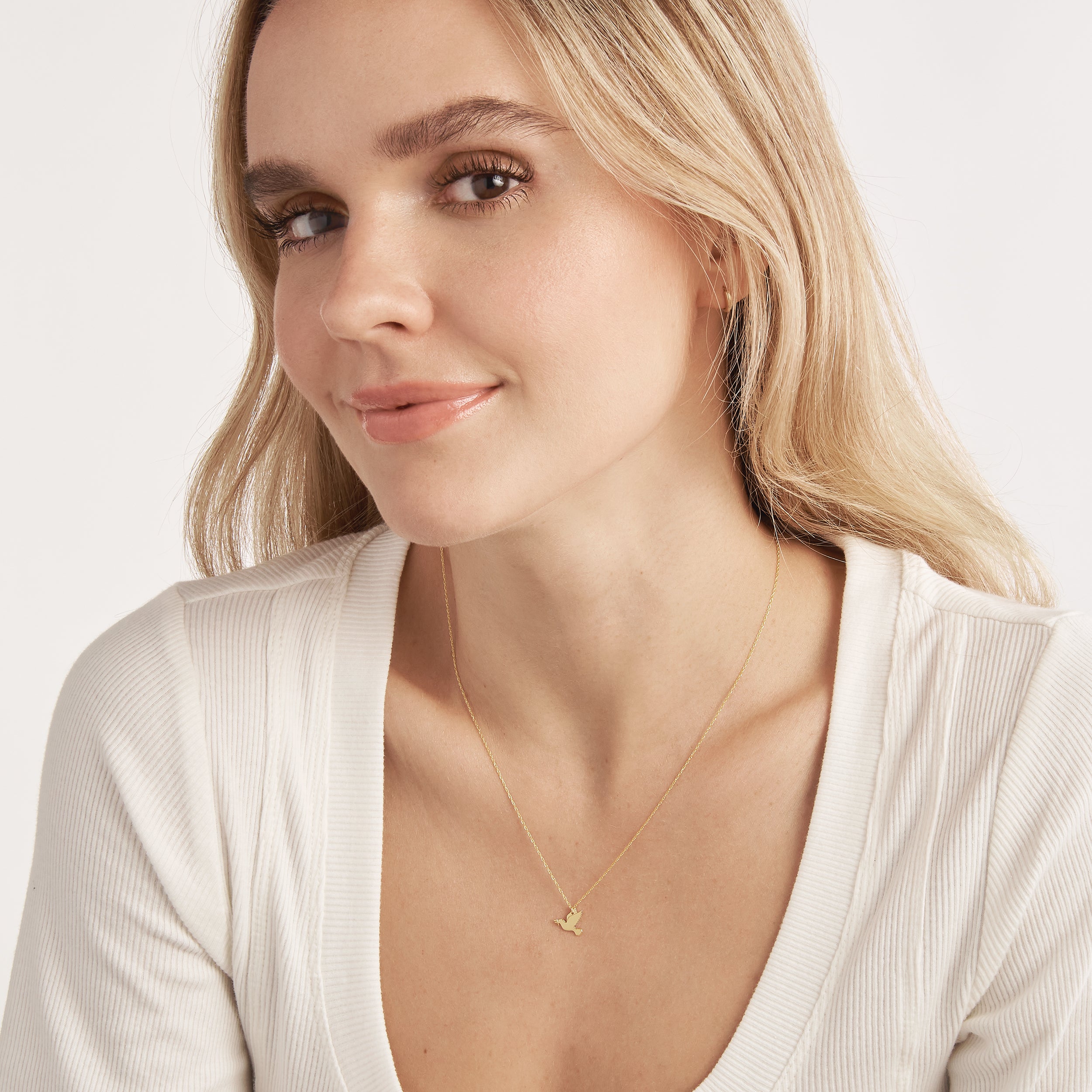 14K gold mini dove pendant necklace, detail view