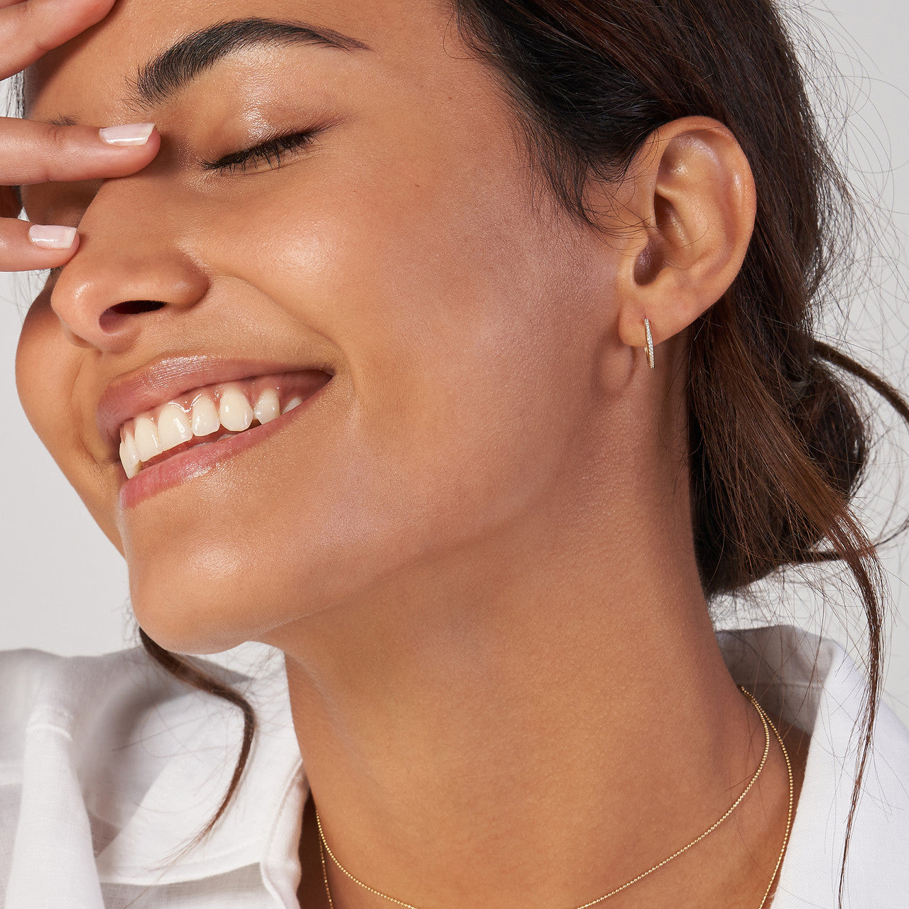 14K gold diamond mini hoop earrings, detail view