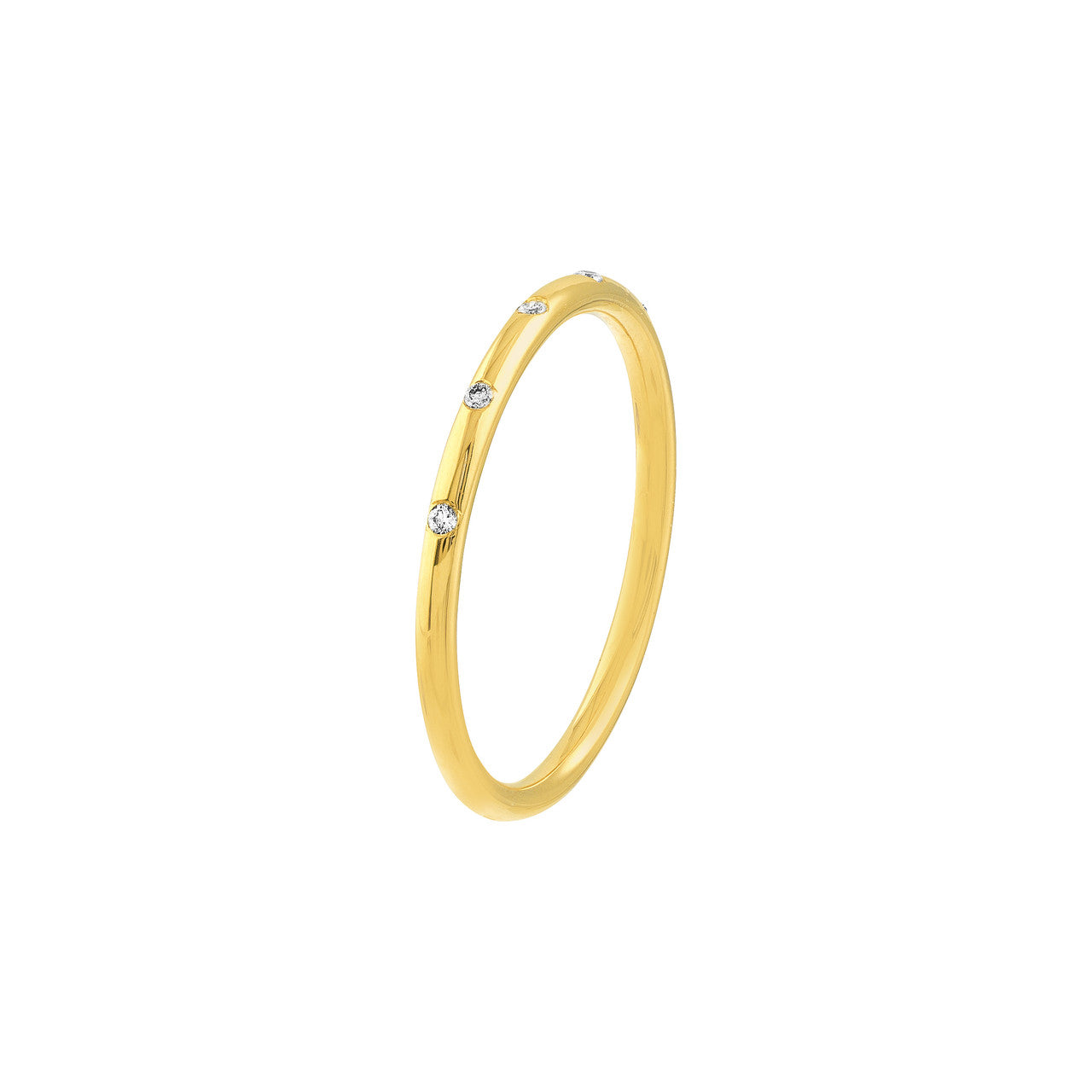 14K gold thin diamond band on a soft background, side view